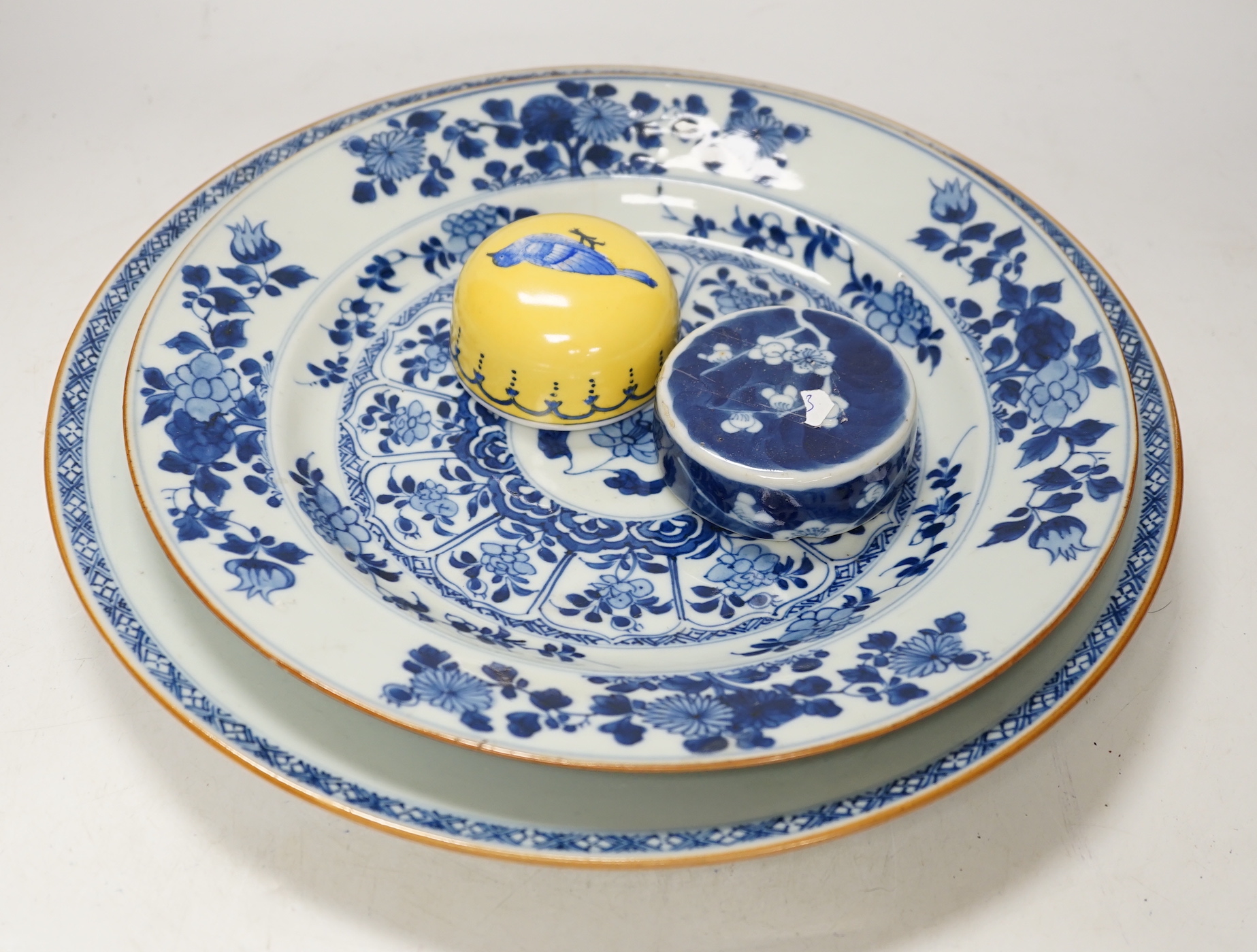 Three Chinese blue and white dishes or plates, Kangxi to Qianlong period and two later covers, largest plate 32cm diameter